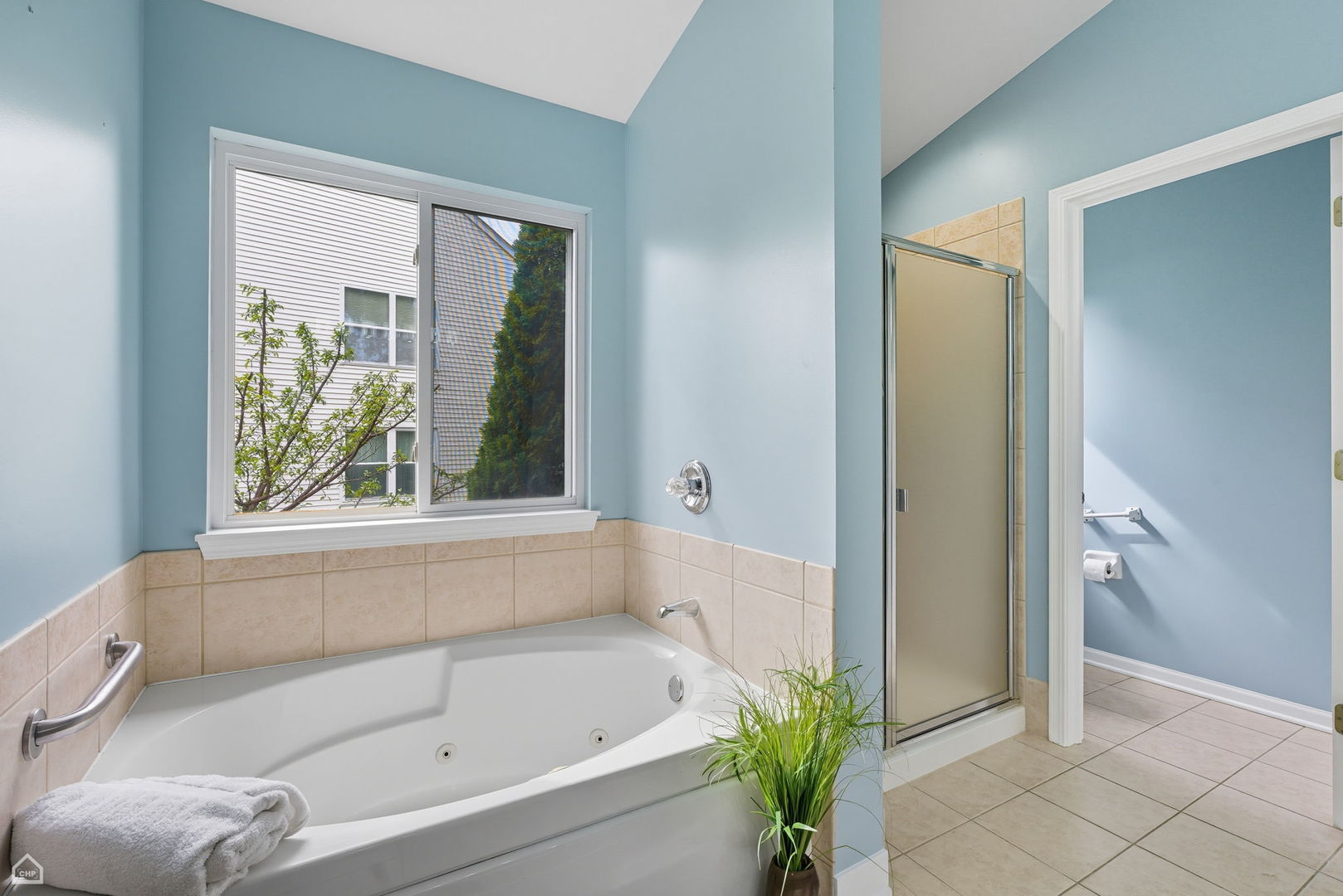2008 Crooked Tree Court McHenry, IL 60050 - Photo 20 of 22 a bathroom with a bathtub and shower