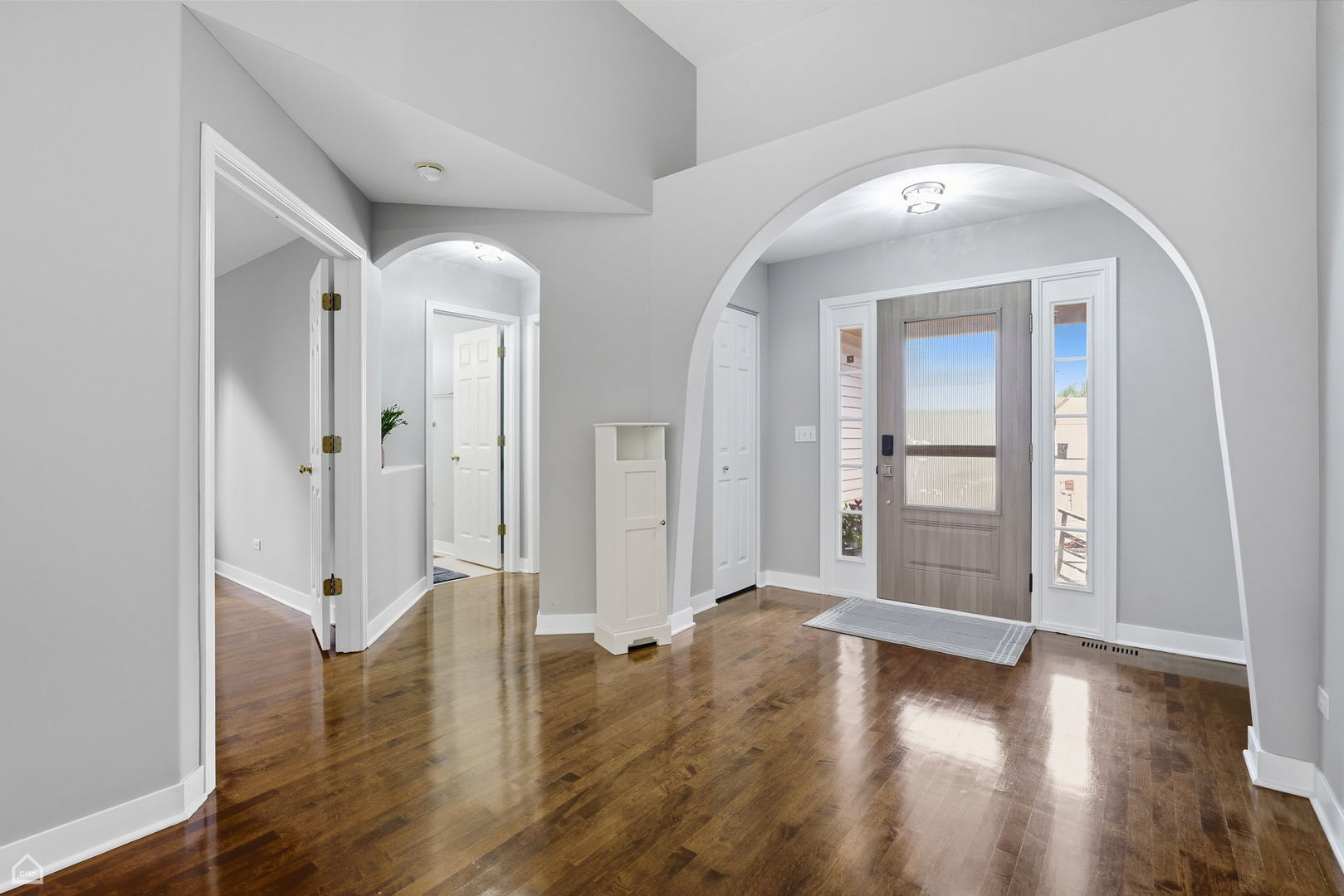 2008 Crooked Tree Court McHenry, IL 60050 - Photo 3 of 22 wooden floor in an empty room with a gallery
