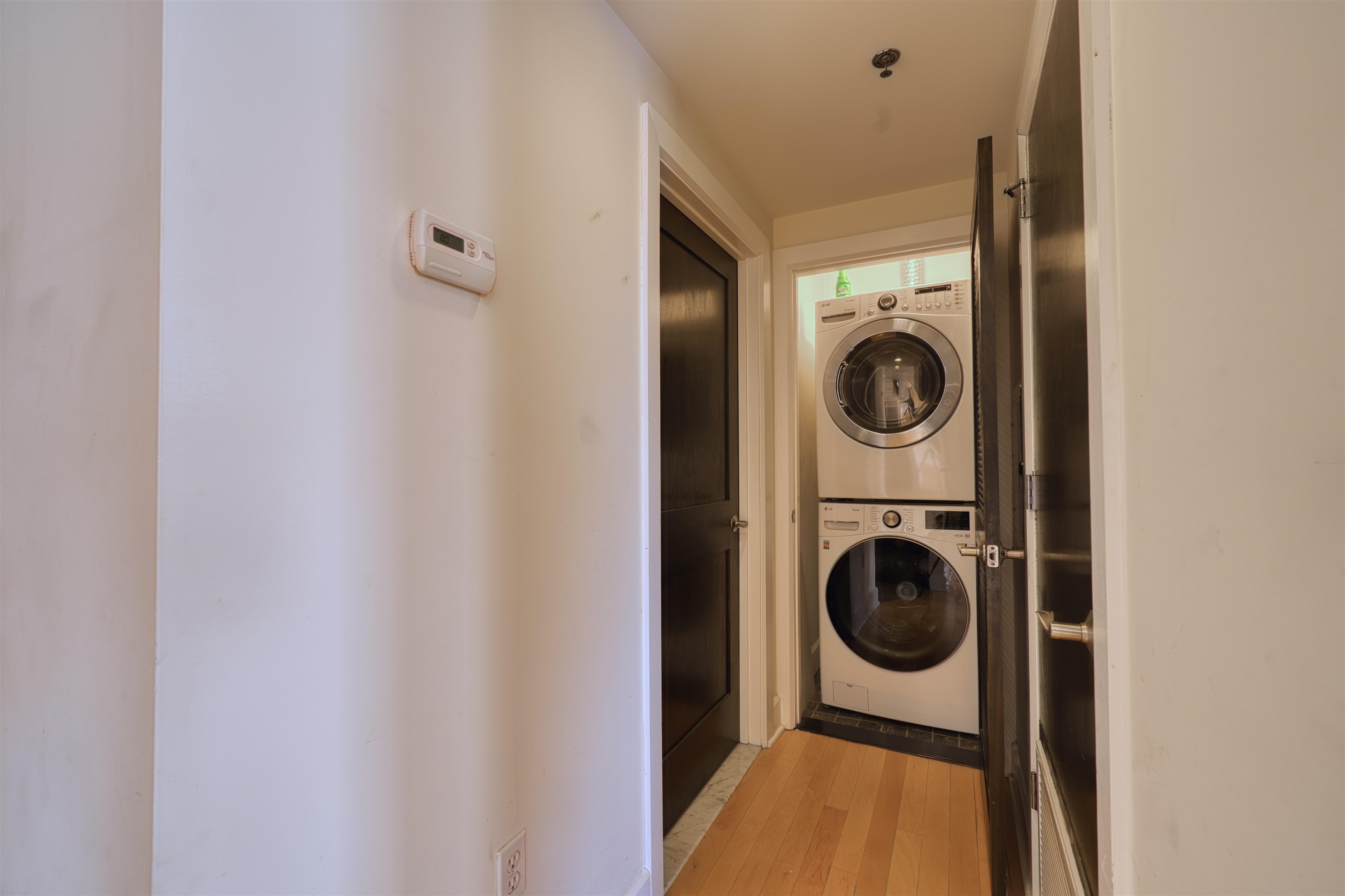 108 Jackson Street, Unit 3A Hoboken, NJ 07030 - Photo 19 of 30 a utility room with dryer and washer