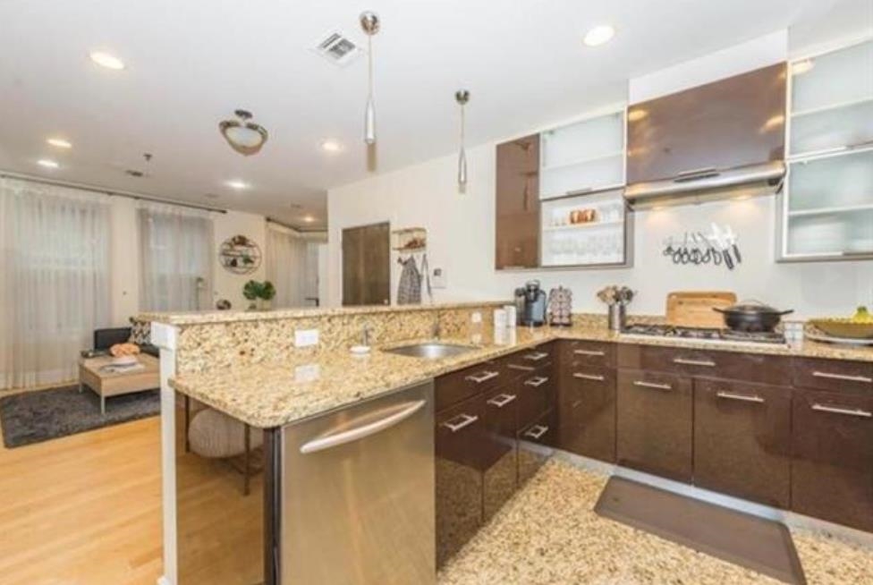 108 Jackson Street, Unit 3A Hoboken, NJ 07030 - Photo 20 of 30 a kitchen with granite countertop a sink and a stove