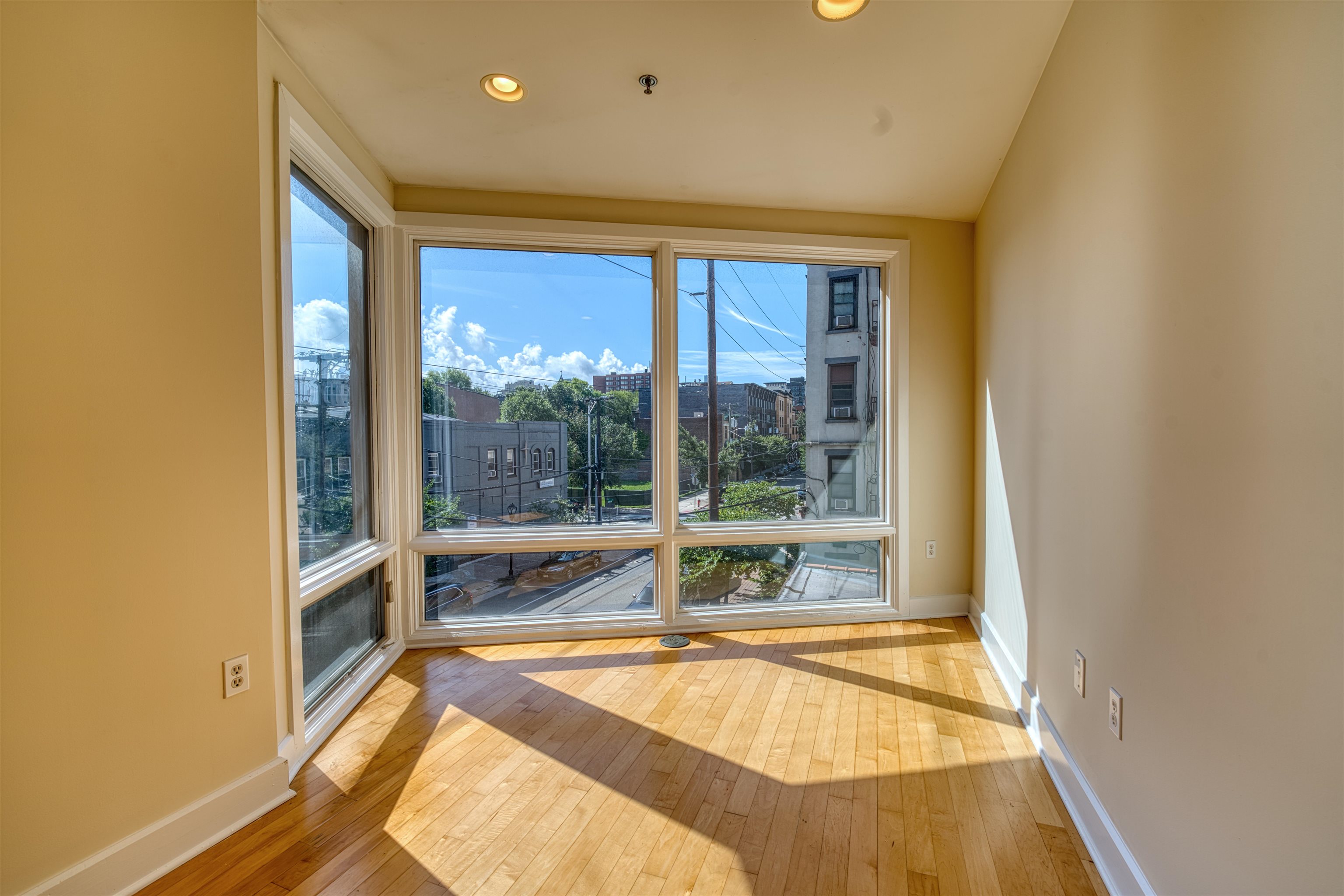 108 Jackson Street, Unit 3A Hoboken, NJ 07030 - Photo 21 of 30 a view of an empty room and window