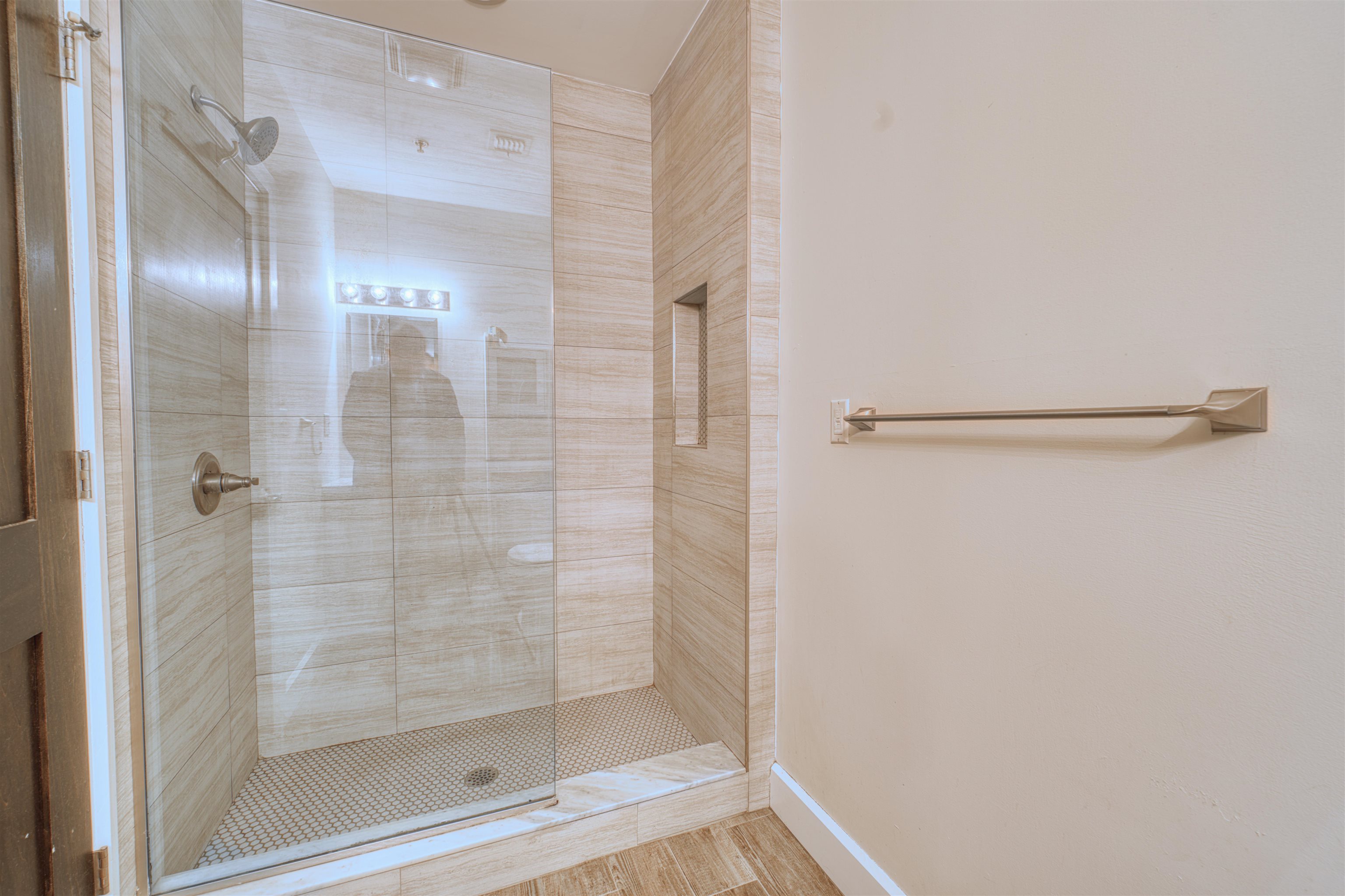108 Jackson Street, Unit 3A Hoboken, NJ 07030 - Photo 25 of 30 a bathroom with a glass shower door