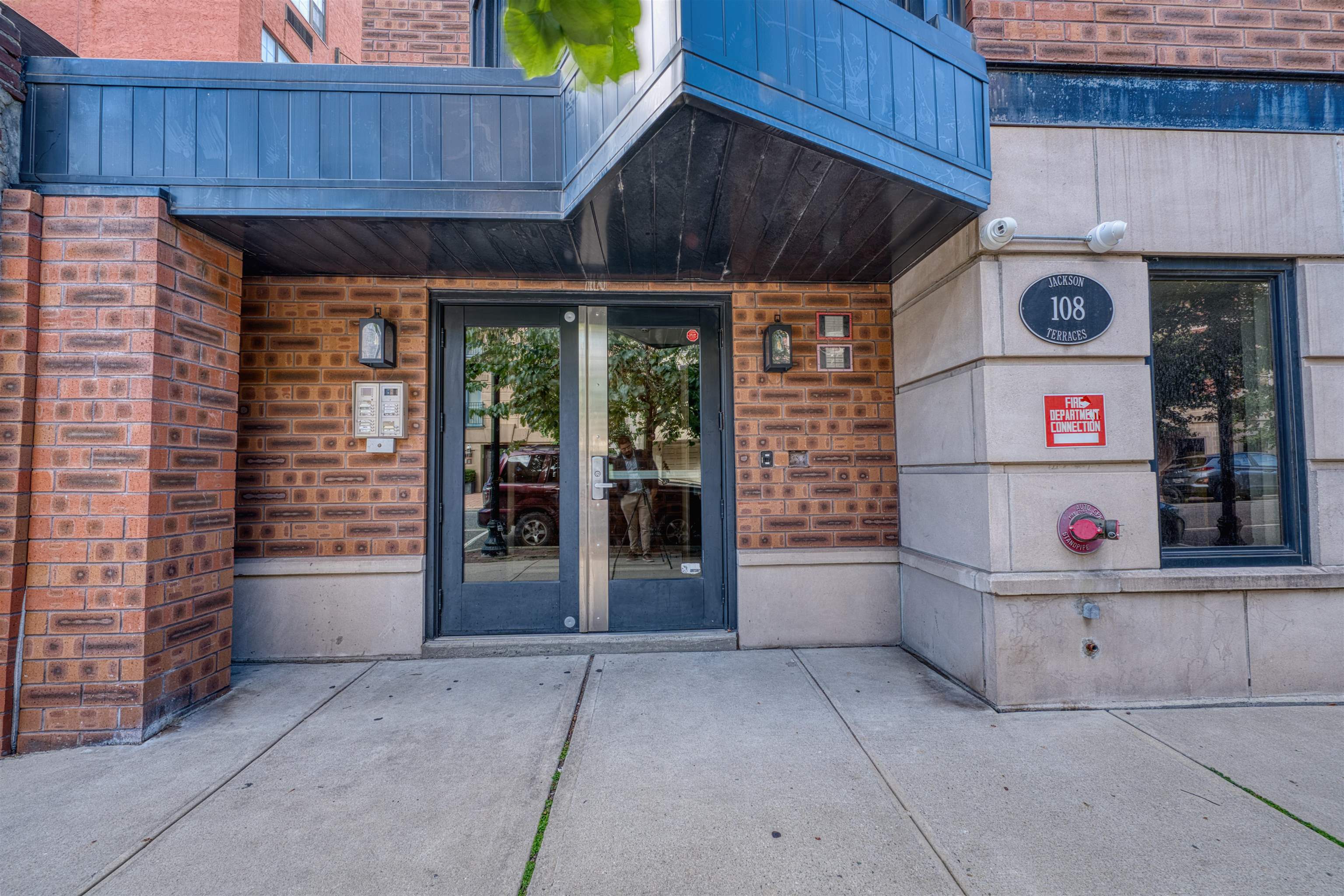 108 Jackson Street, Unit 3A Hoboken, NJ 07030 - Photo 30 of 30 a view of front door of house and car parked