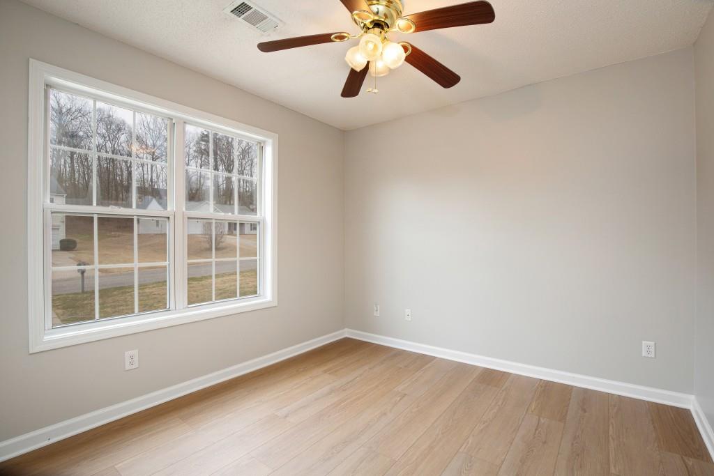 8440 River Bluff Place Ball Ground, GA 30107 - Photo 39 of 73 an empty room with a window