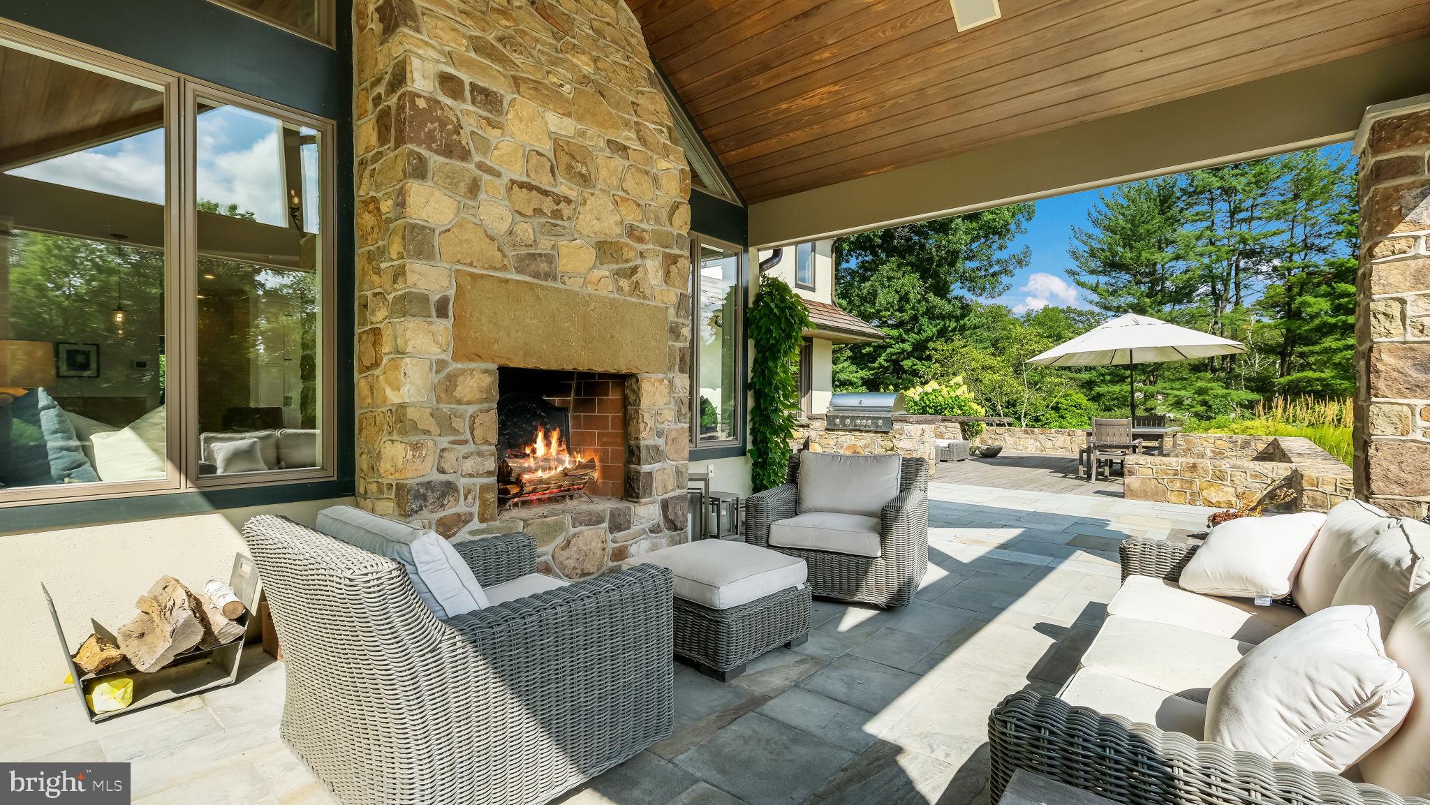2970 Ash Mill Road Doylestown, PA 18902 - Photo 118 of 144 Covered Porch with Stone Fireplace (gas)