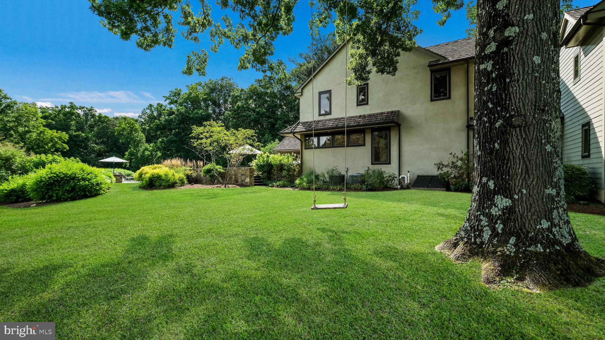2970 Ash Mill Road Doylestown, PA 18902 - Photo 136 of 144 Side yard with Oak Tree and swing!