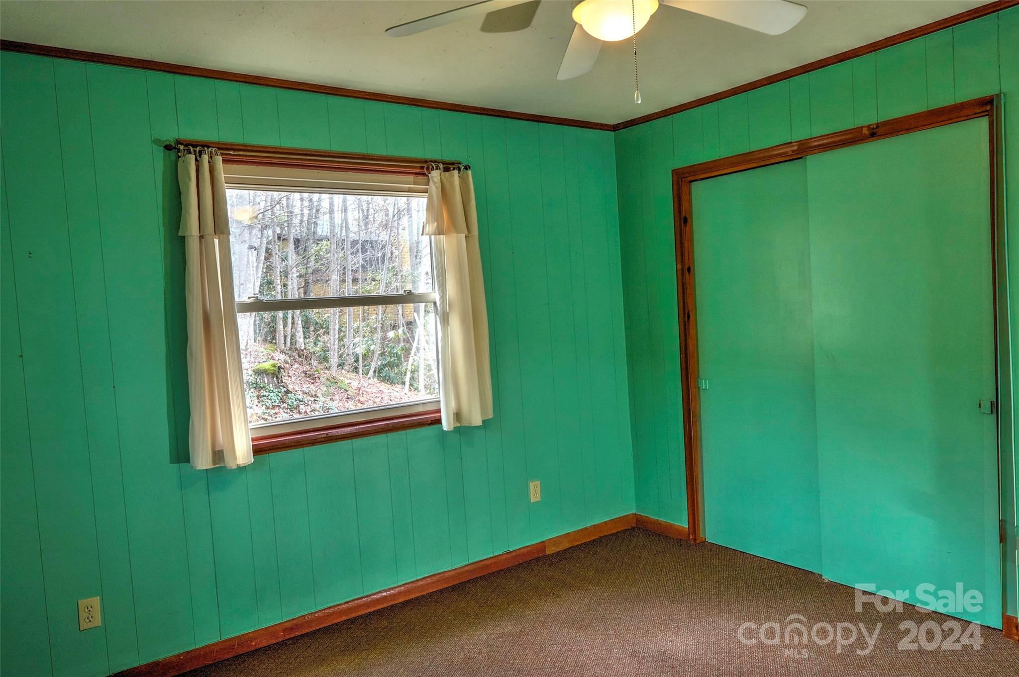 344 Pine Ridge Trail Almond, NC 28702 - Photo 11 of 34 a view of an empty room with a window