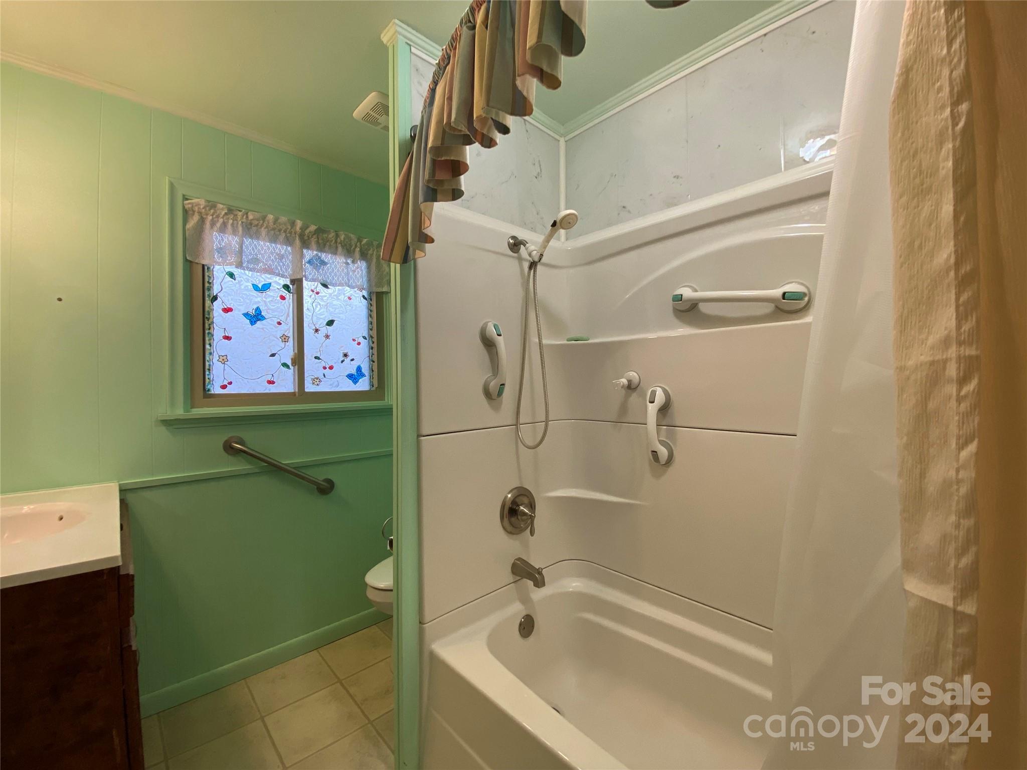 344 Pine Ridge Trail Almond, NC 28702 - Photo 12 of 34 a bathroom with a bathtub and shower
