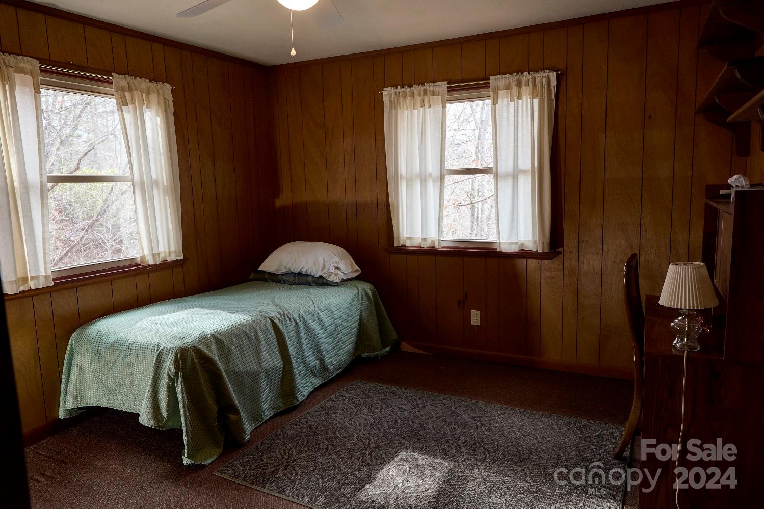 344 Pine Ridge Trail Almond, NC 28702 - Photo 13 of 34 a bedroom with a bed and a window