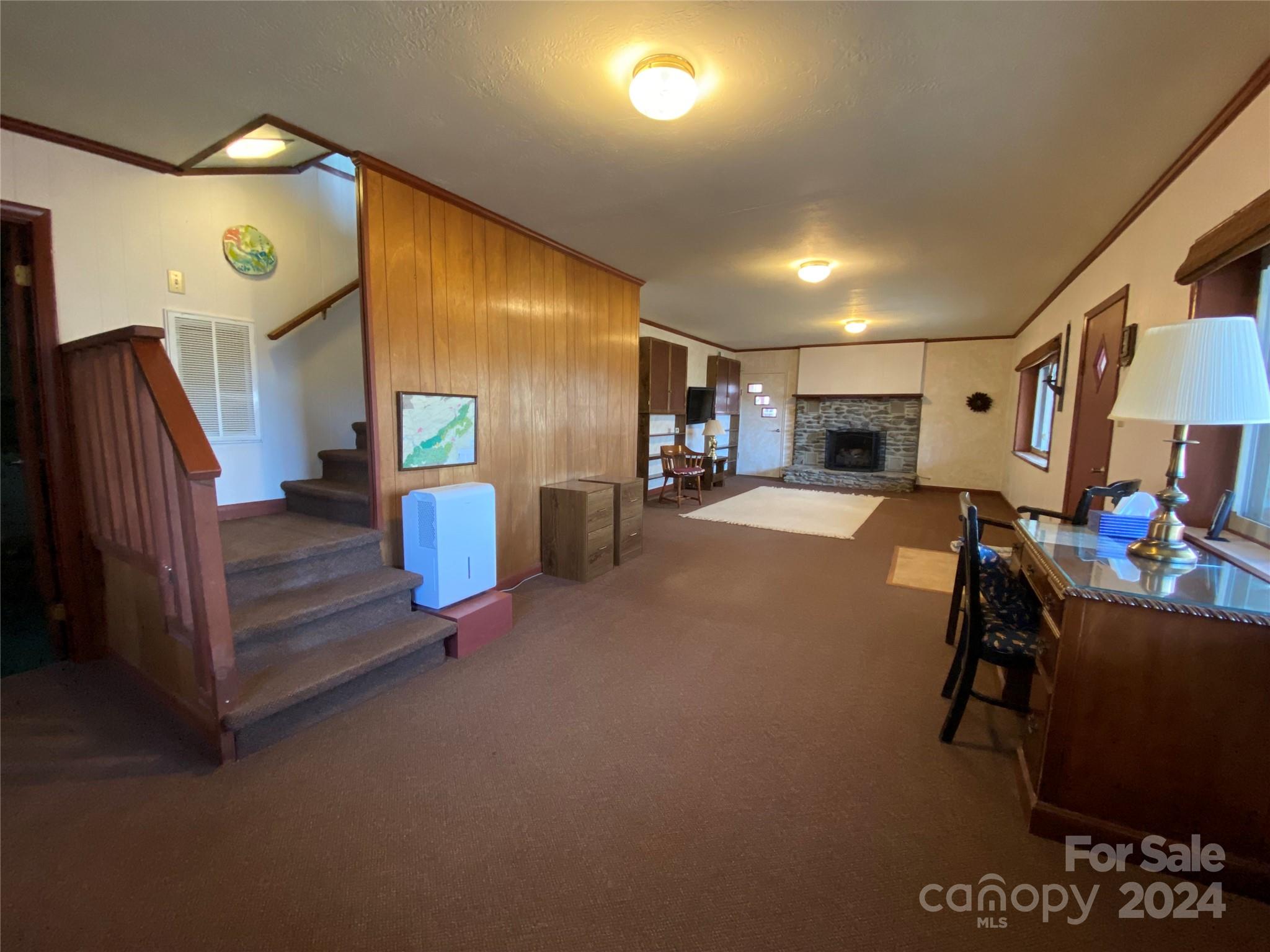 344 Pine Ridge Trail Almond, NC 28702 - Photo 14 of 34 a room with gym equipment and a large window