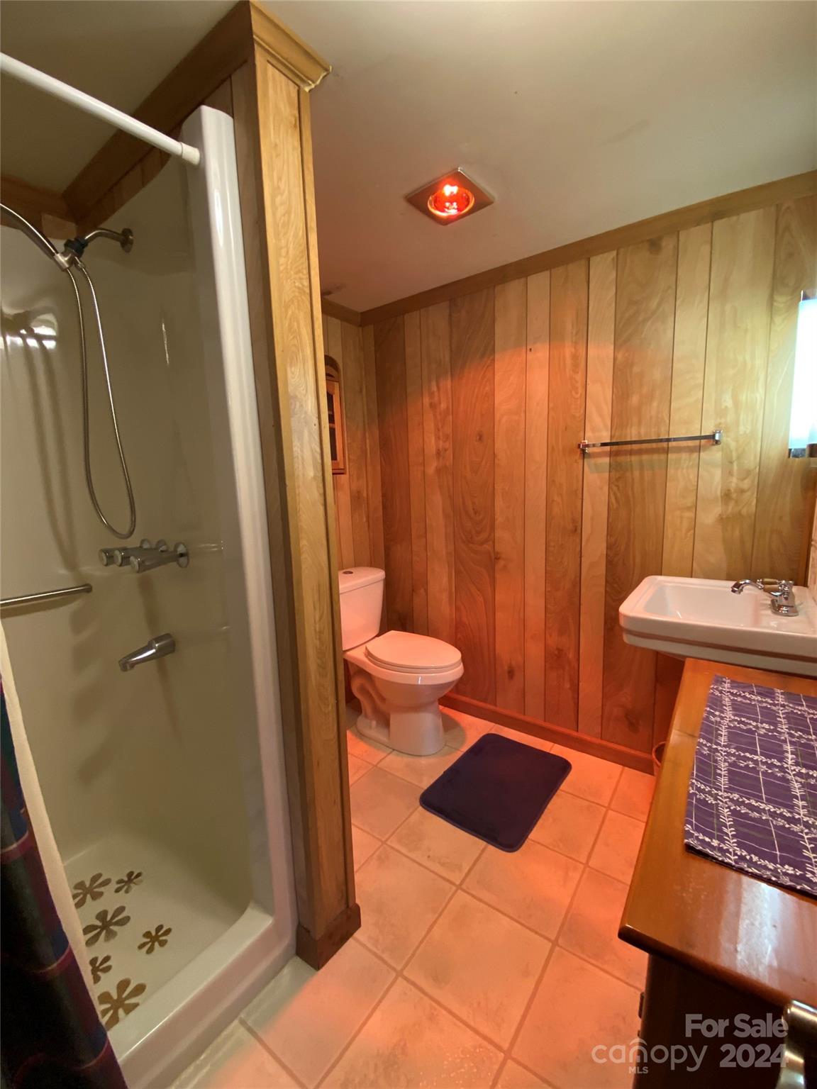 344 Pine Ridge Trail Almond, NC 28702 - Photo 20 of 34 a bathroom with a sink and a shower