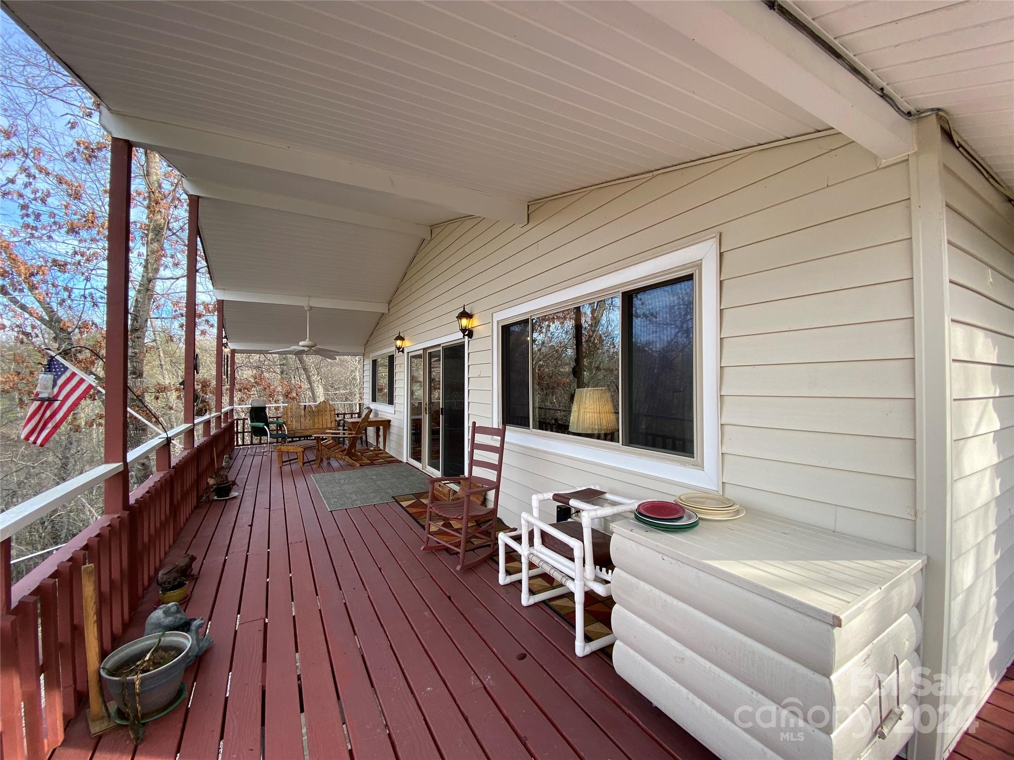 344 Pine Ridge Trail Almond, NC 28702 - Photo 23 of 34 a living room with furniture and a flat screen tv