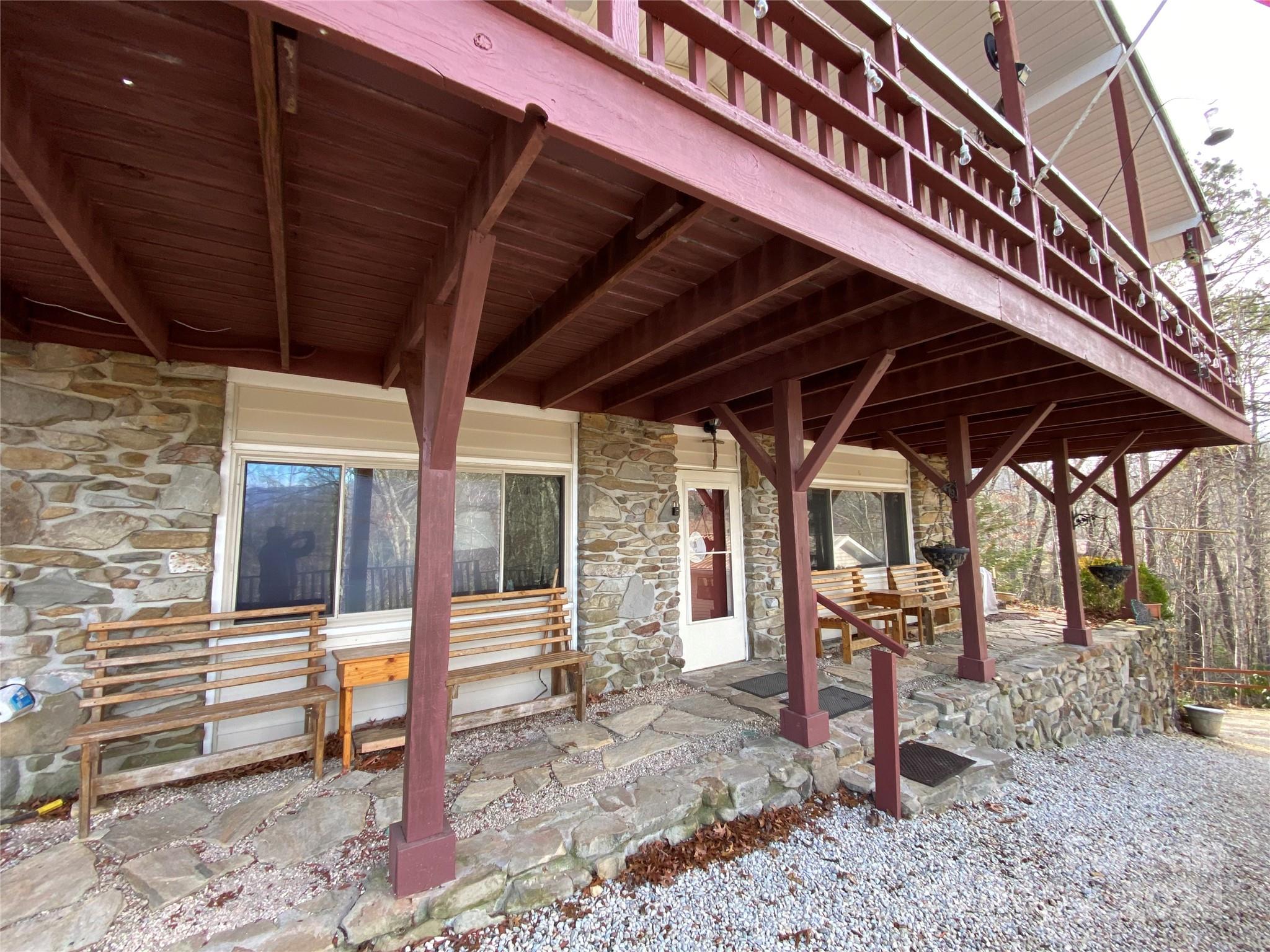 344 Pine Ridge Trail Almond, NC 28702 - Photo 28 of 34 a view of a chairs and table in the patio