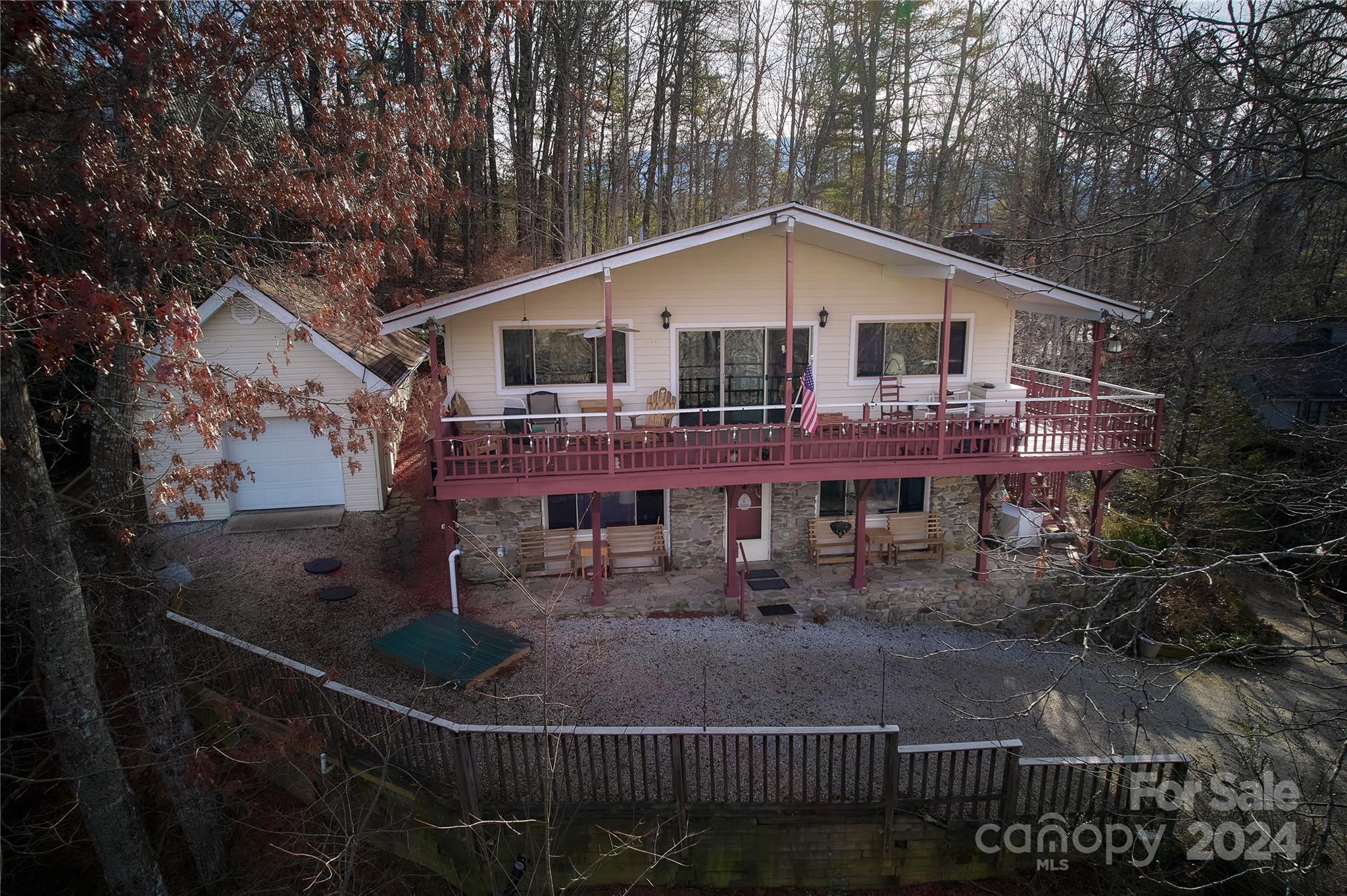 344 Pine Ridge Trail Almond, NC 28702 - Photo 34 of 34 a view of a house with a patio