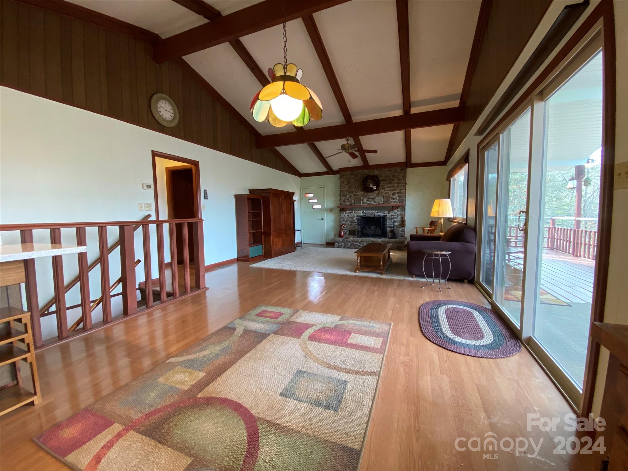 344 Pine Ridge Trail Almond, NC 28702 - Photo 8 of 34 a lobby with furniture and a flat screen tv