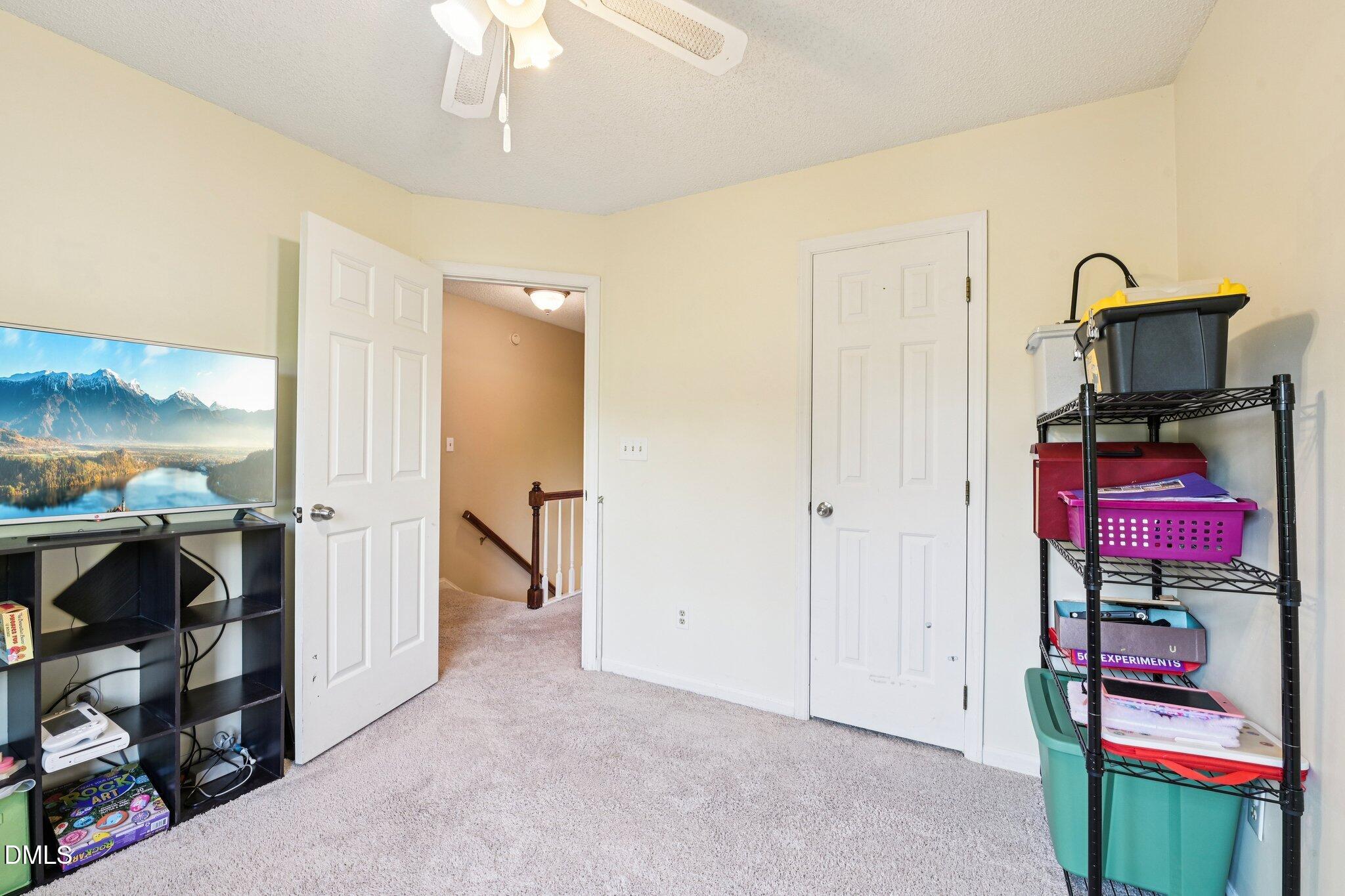 4508 Emmit Drive Raleigh, NC 27604 - Photo 24 of 42 a view of a room with gym equipment