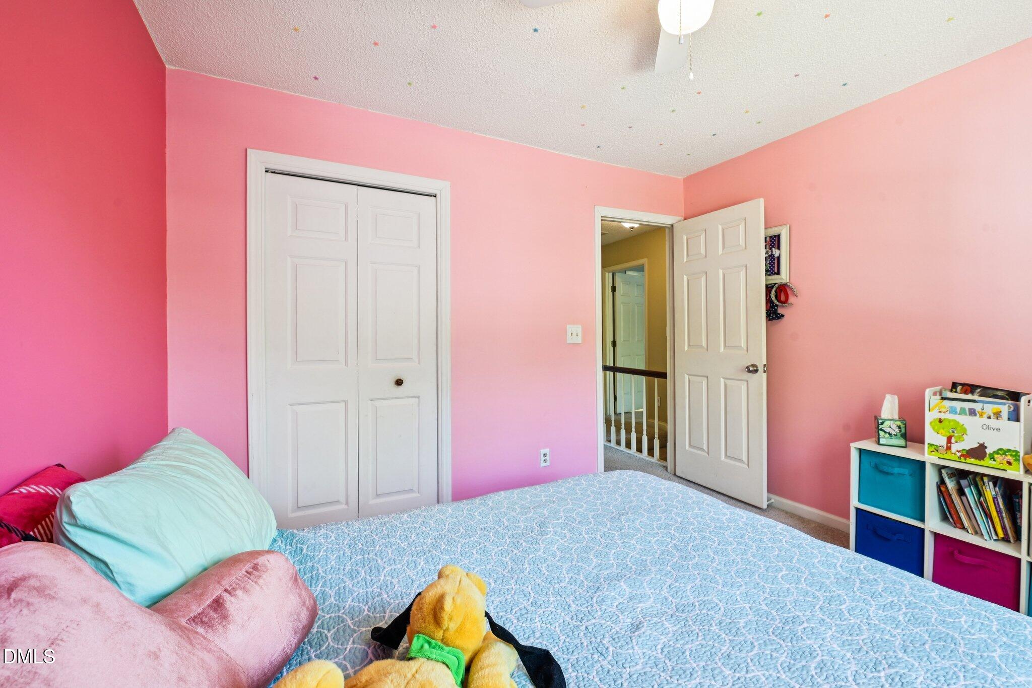 4508 Emmit Drive Raleigh, NC 27604 - Photo 26 of 42 a bedroom with furniture and a bed