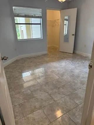 an empty room with windows