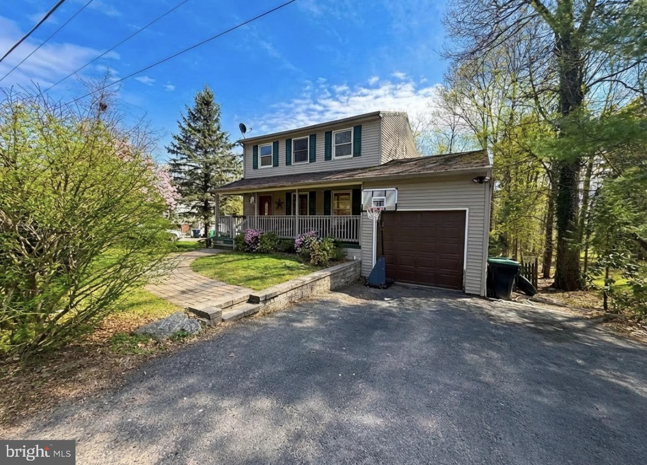 35 Hillside Road Pottsville, PA 17901 - Photo 2 of 2 Charming home with lush greenery.