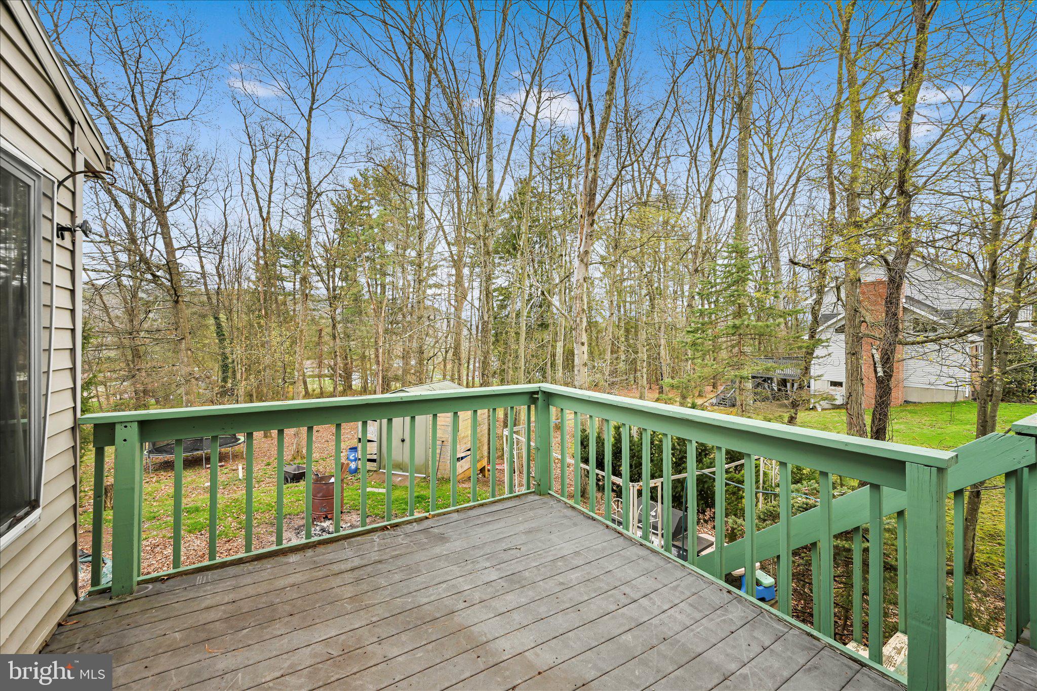 35 Hillside Road Pottsville, PA 17901 - Photo 28 of 33 Serene deck overlooking lush greenery.