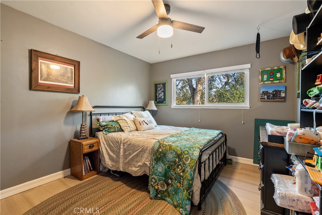 8892 Palomar Avenue Atascadero, CA 93422 - Photo 16 of 49 This room features laminate flooring and a ceiling fan, providing both style and added comfort.