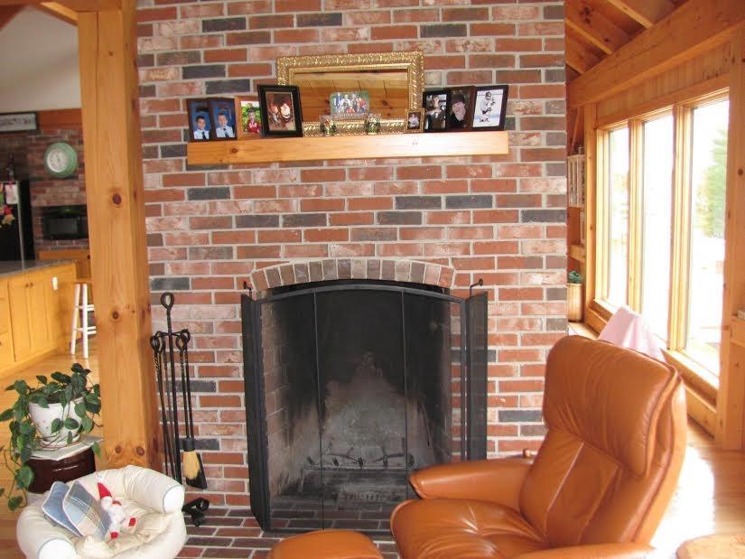 476 Looks Point Road Jonesboro, ME 04648 - Photo 29 of 35 Brick fireplace in family room.