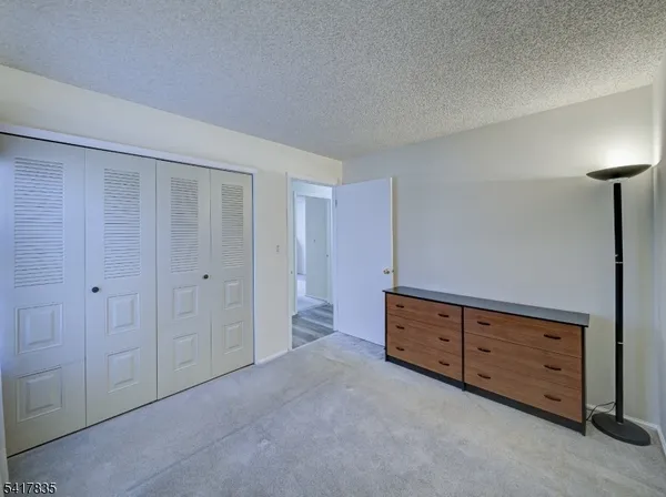 an empty room with cabinet