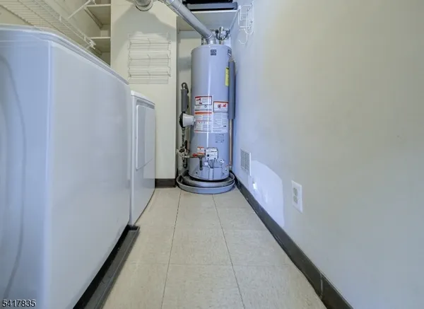 a view of a hallway with seating area