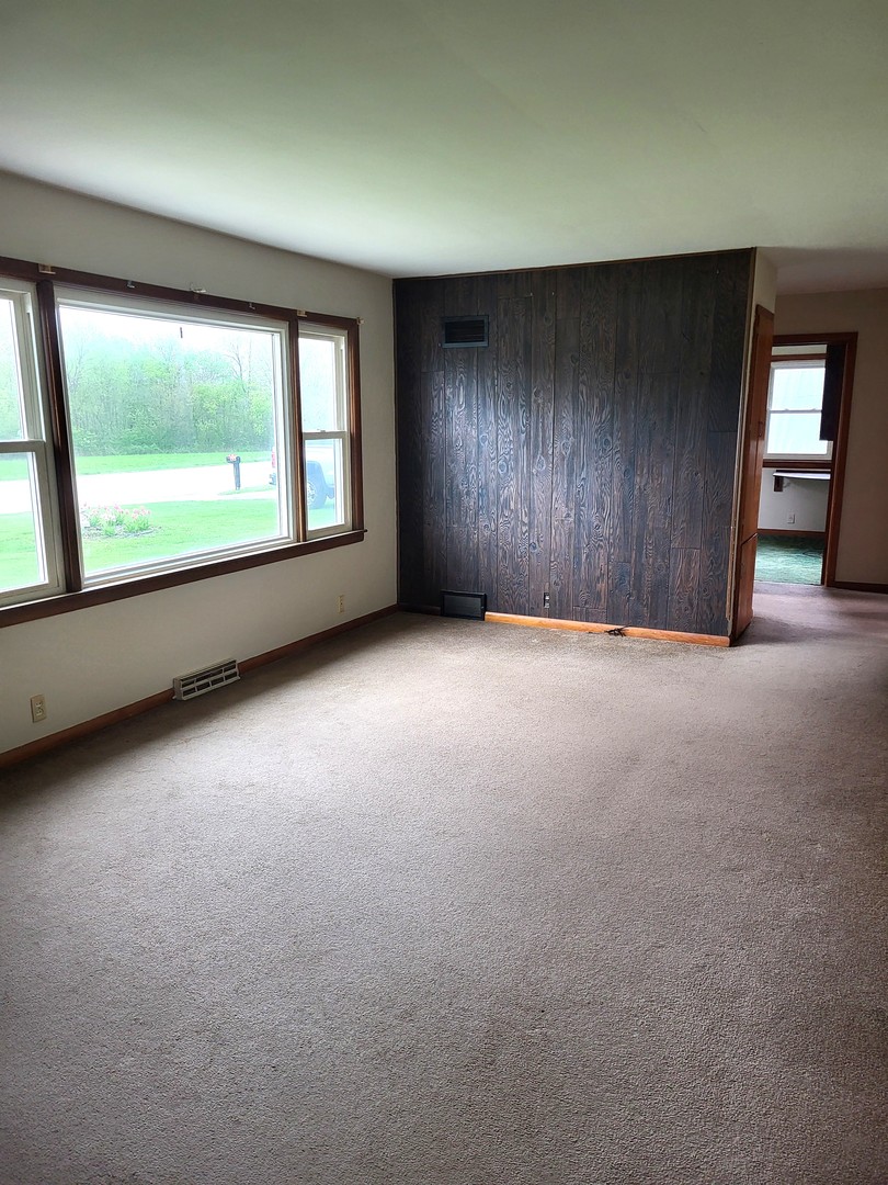5890 Highway 2 Oregon, IL 61061 - Photo 3 of 18 an empty room with windows and closet