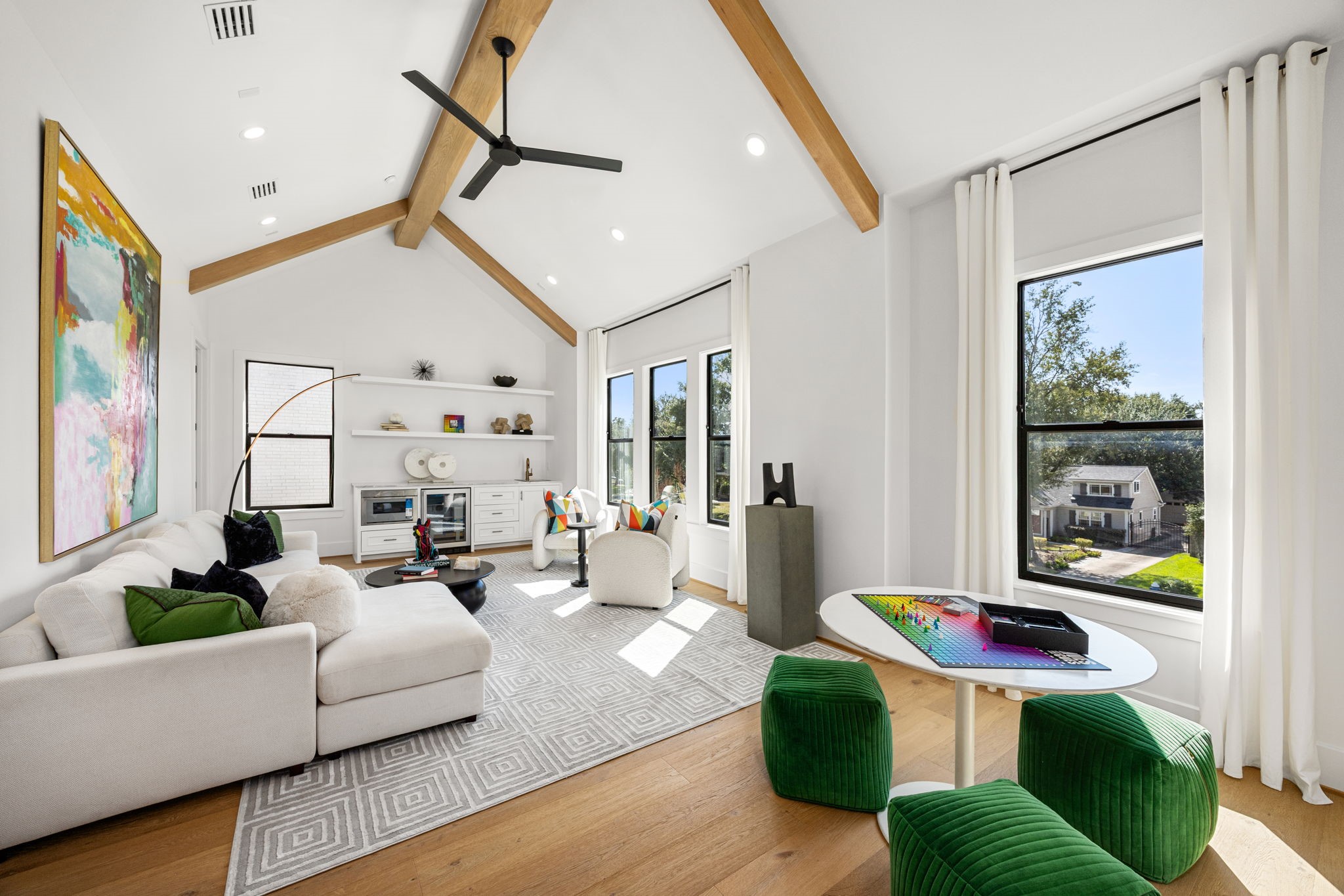 1032 West 41st Street Houston, TX 77018 - Photo 20 of 46 2nd Floor Game Room is fully loaded w/ wet bar/snack bar including a beverage fridge, built-in drawer microwave & floating shelves.