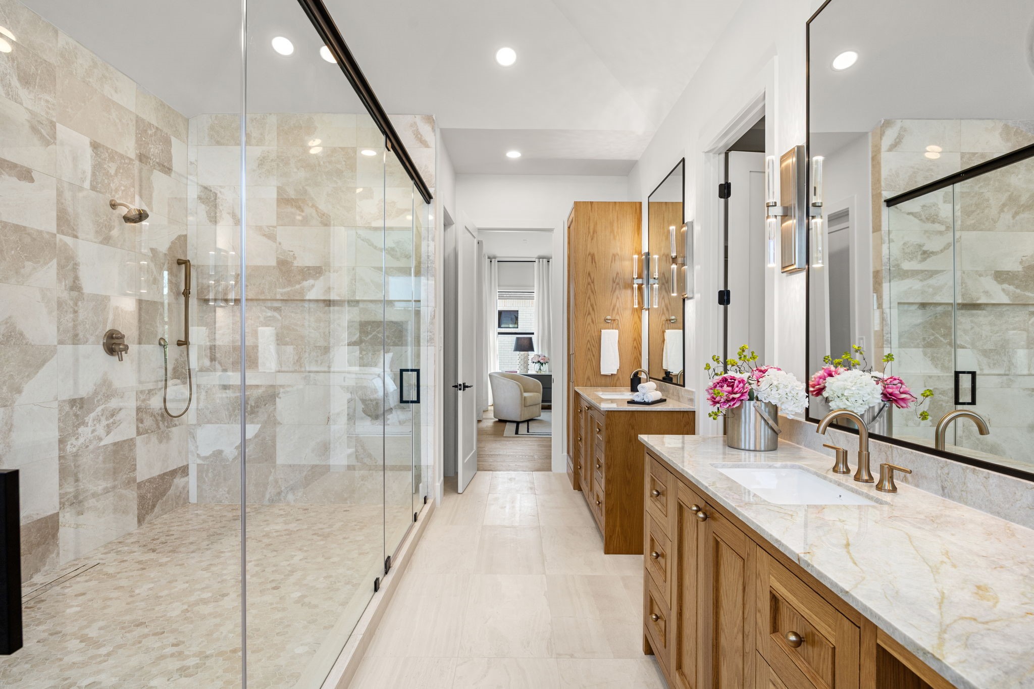 1032 West 41st Street Houston, TX 77018 - Photo 25 of 46 Incredible Primary Bathroom features over-sized walk-in glass encased shower w/ 2 sets of fixtures & soak tub, Custom Site built cabinetry & natural stone wall tile