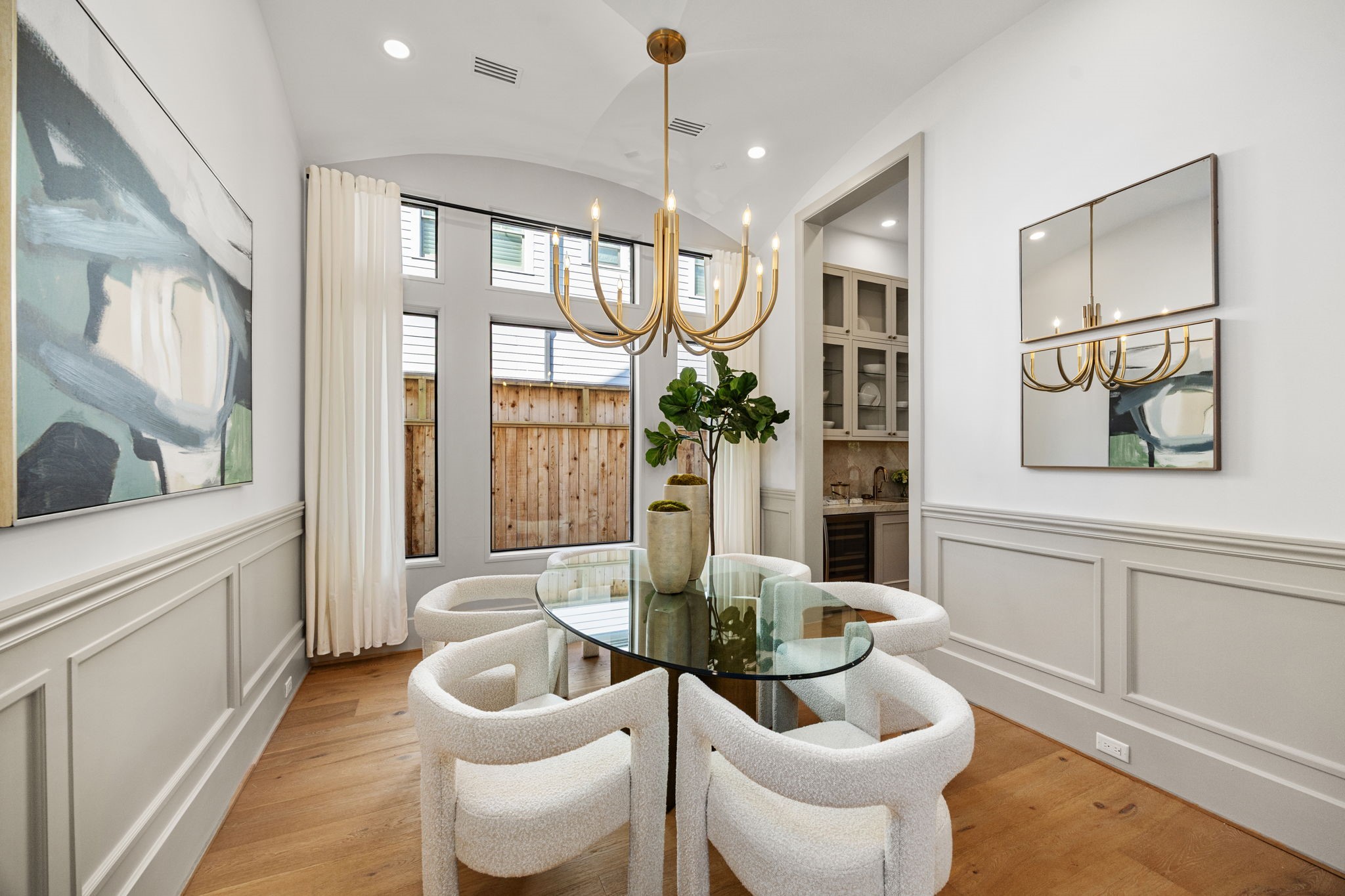 1032 West 41st Street Houston, TX 77018 - Photo 8 of 46 Formal Dining room offers wainscoting, arched ceiling beam detail and large windows. back entry to Butler's Pantry.