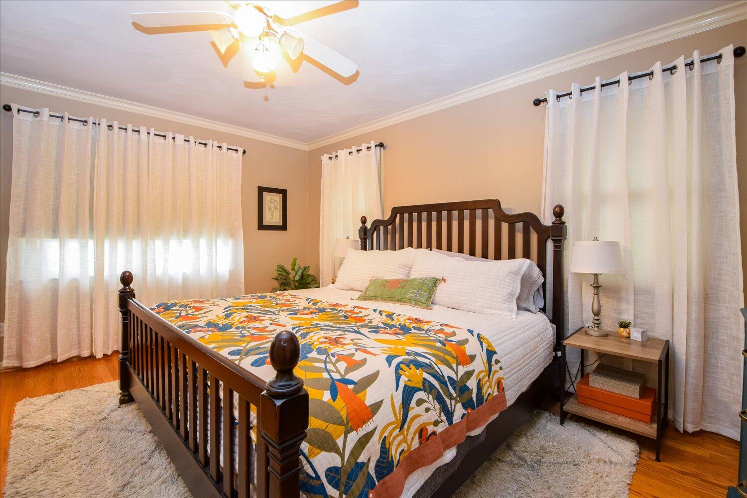 3068 Sedgefield Road Southwest Roanoke, VA 24018 - Photo 15 of 36 a bedroom with a bed and a chandelier