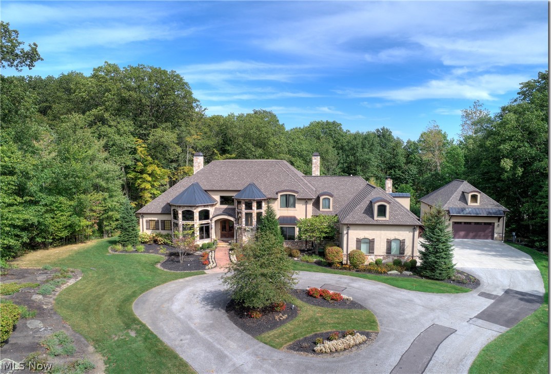 2783 Som Center Road Chagrin Falls, OH 44022 - Photo 2 of 33 Enjoy the privacy this Tuscan inspired custom statement home has to offer!