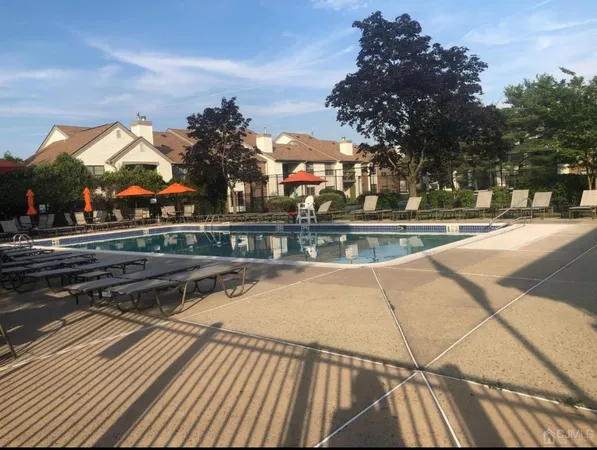 a view of a building and with trees