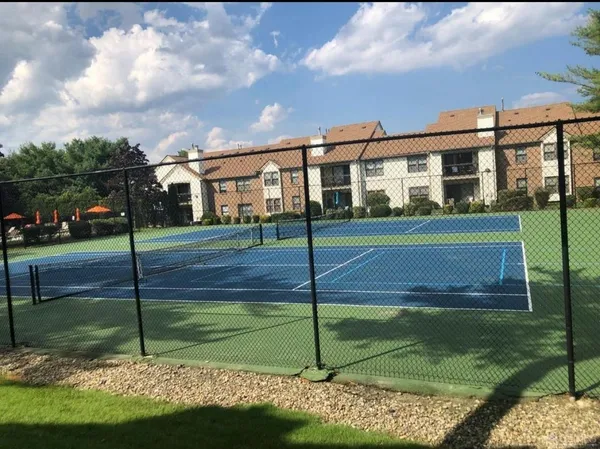 a view of a house with a big yard