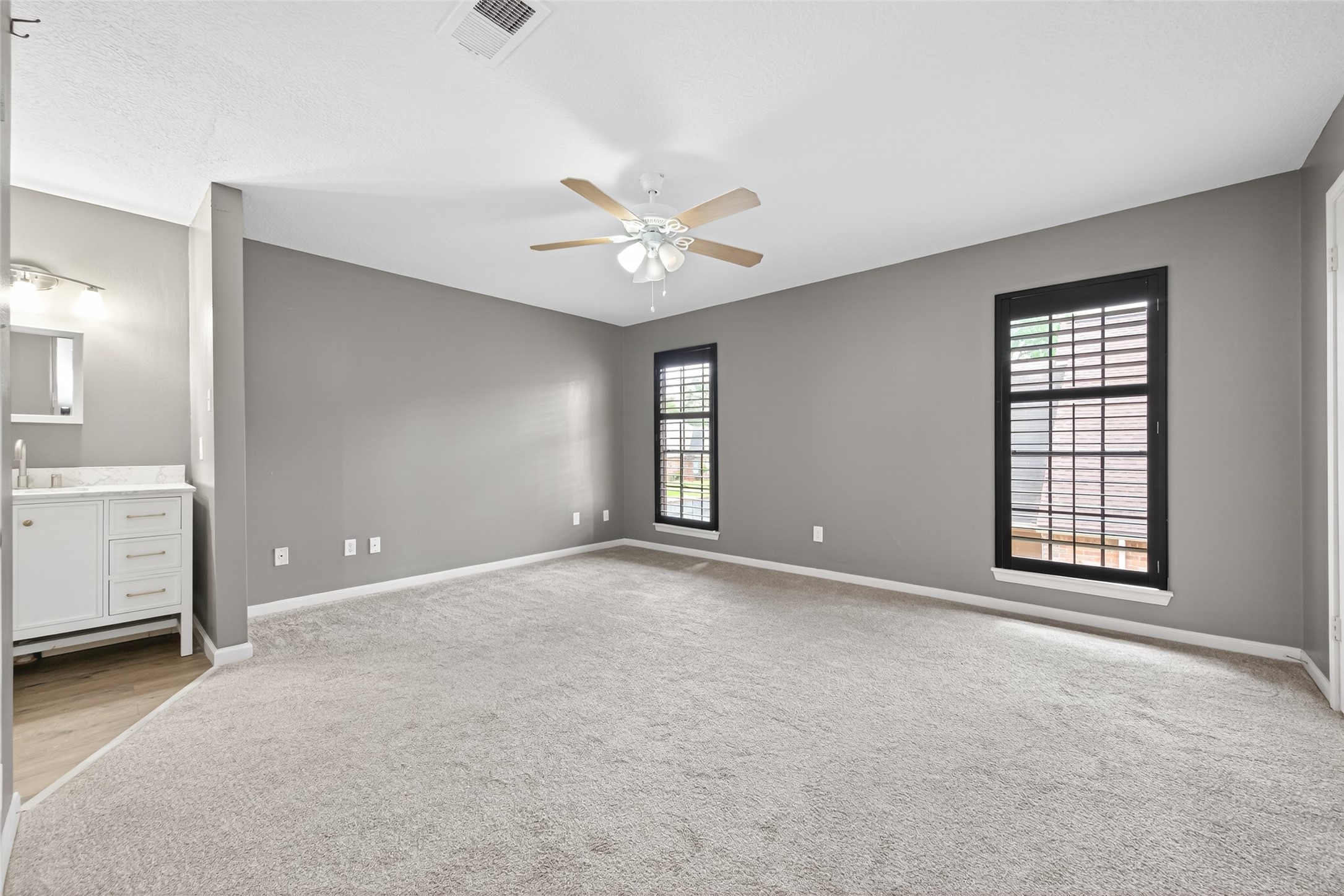 6700 Richardson Road, Unit 305 Houston, TX 77069 - Photo 20 of 46 a view of an empty room with a window