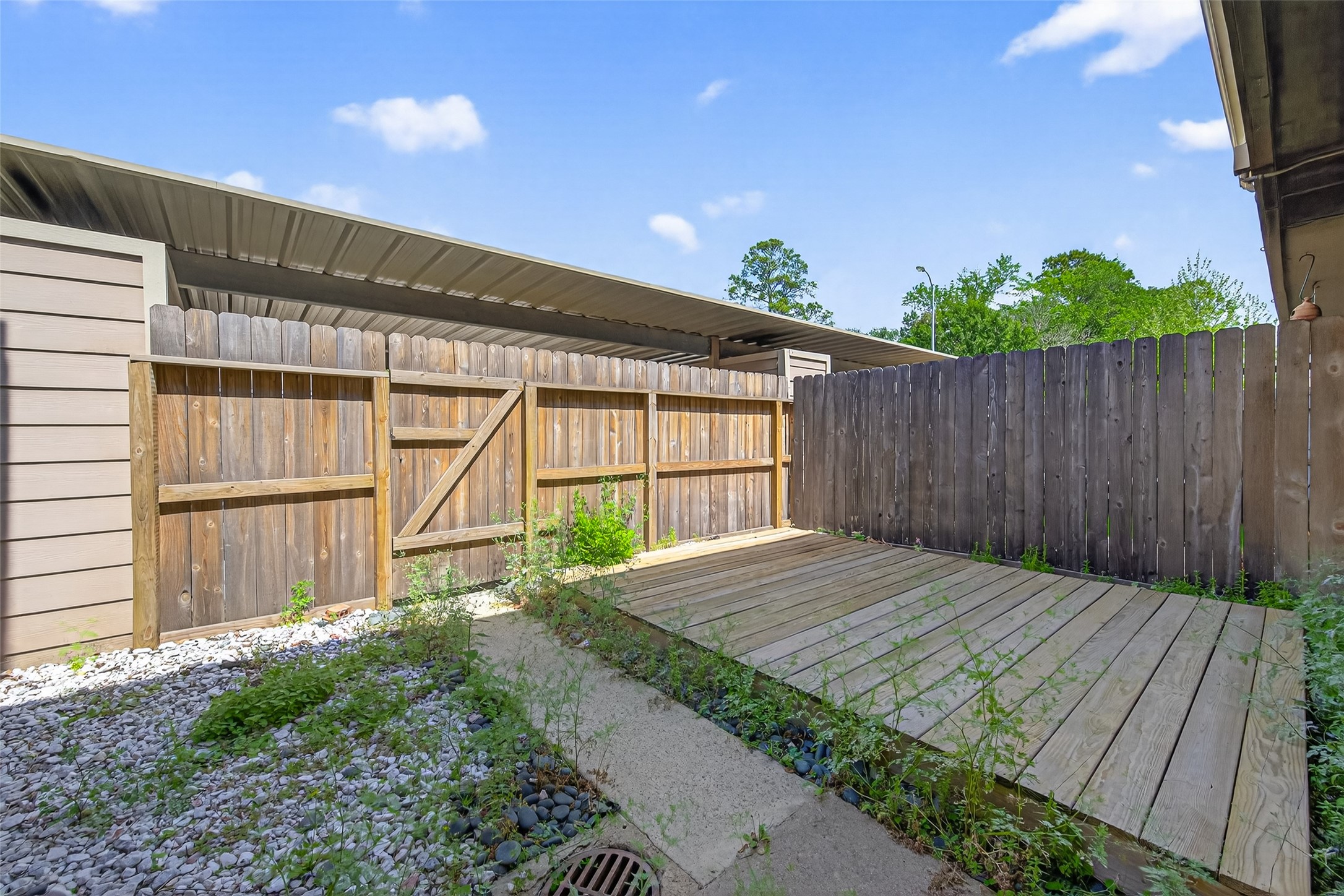 6700 Richardson Road, Unit 305 Houston, TX 77069 - Photo 39 of 46 a house view with a backyard space