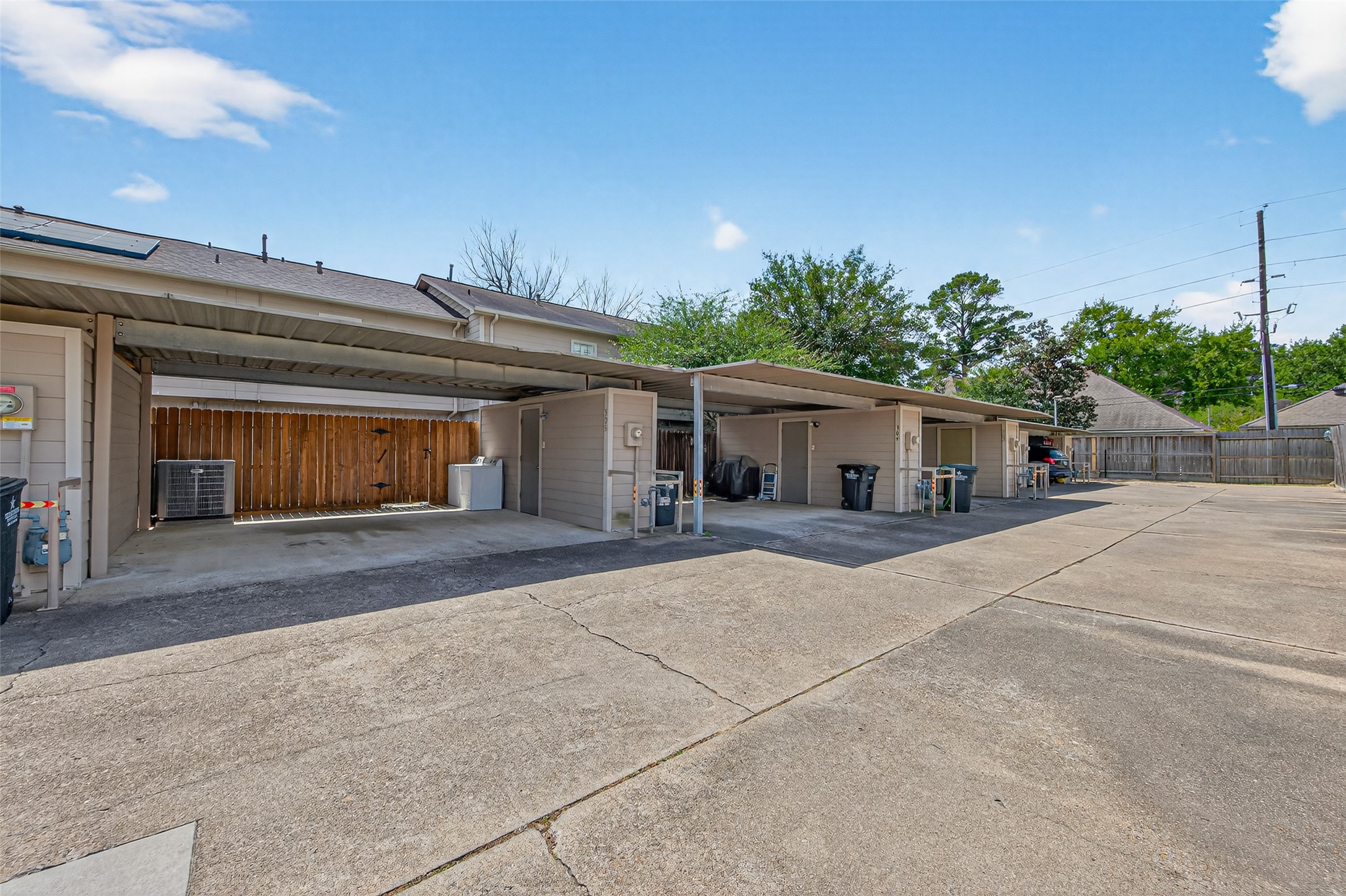 6700 Richardson Road, Unit 305 Houston, TX 77069 - Photo 46 of 46 a front view of a house with a yard and garage