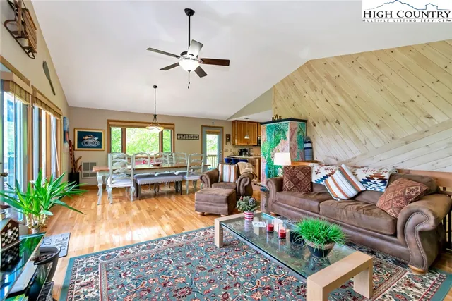 a view of a balcony with furniture and a window
