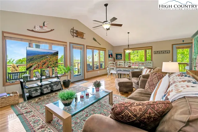 a view of a two chairs in the balcony