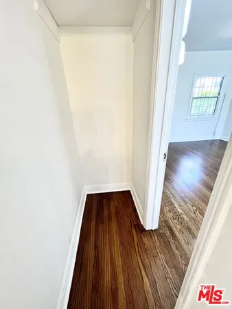 a view of entryway with wooden floor