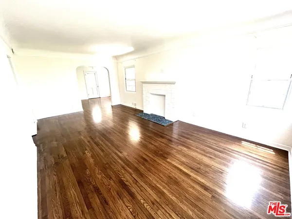 a view of a living room with a rug