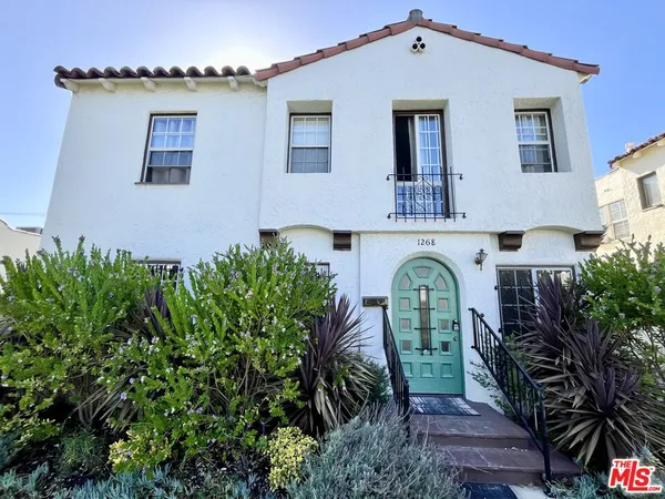 a front view of a house with balcony