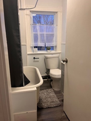 52 Winter Street Taunton, MA 02780 - Photo 18 of 21 a bathroom with a toilet a sink and a window
