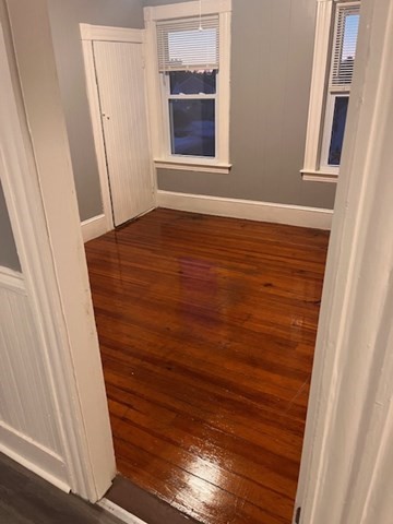 52 Winter Street Taunton, MA 02780 - Photo 20 of 21 an empty room with wooden floor and windows