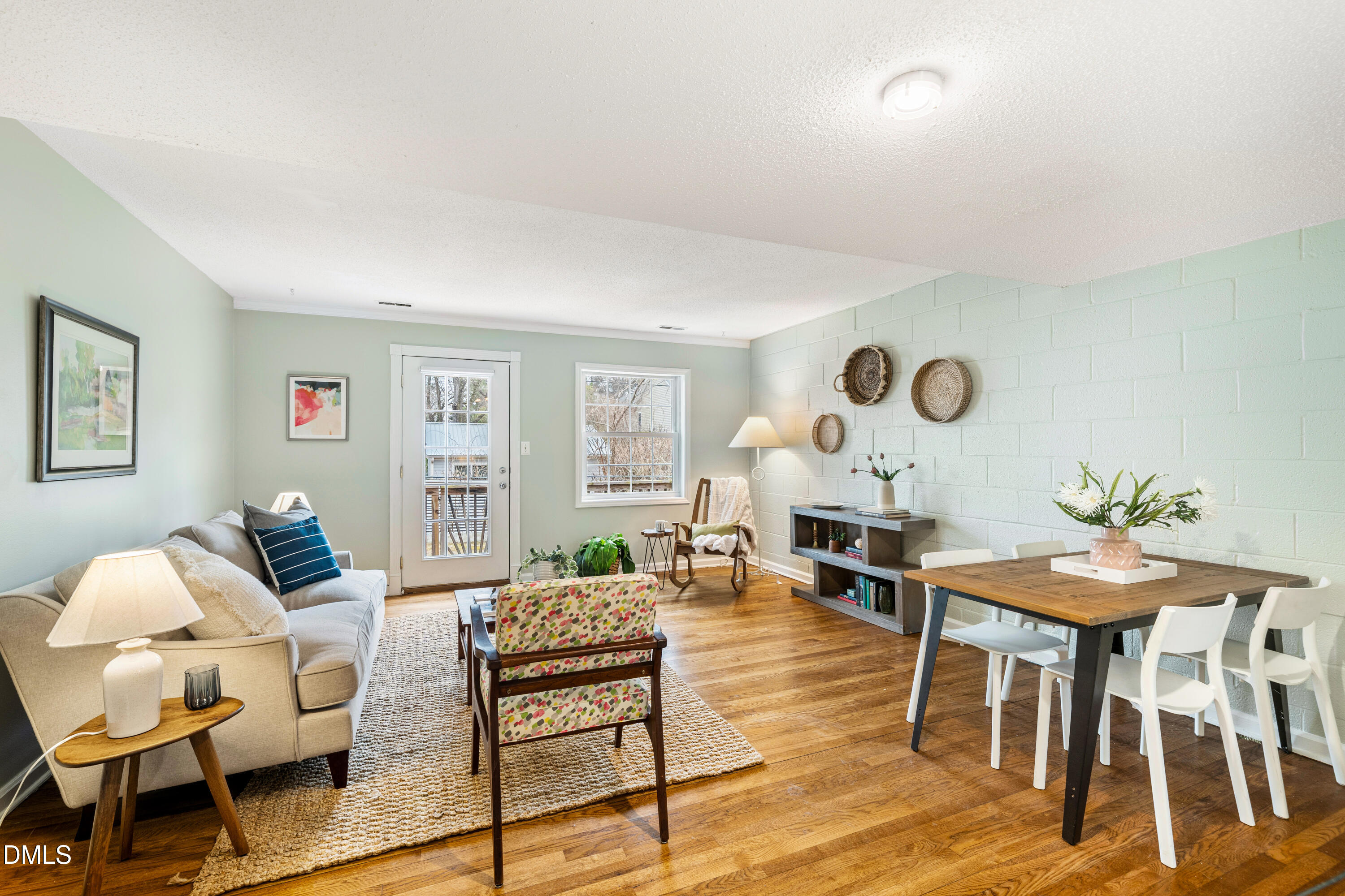 400 Davie Road, Unit 57 Carrboro, NC 27510 - Photo 11 of 28 a living room with furniture and wooden floor