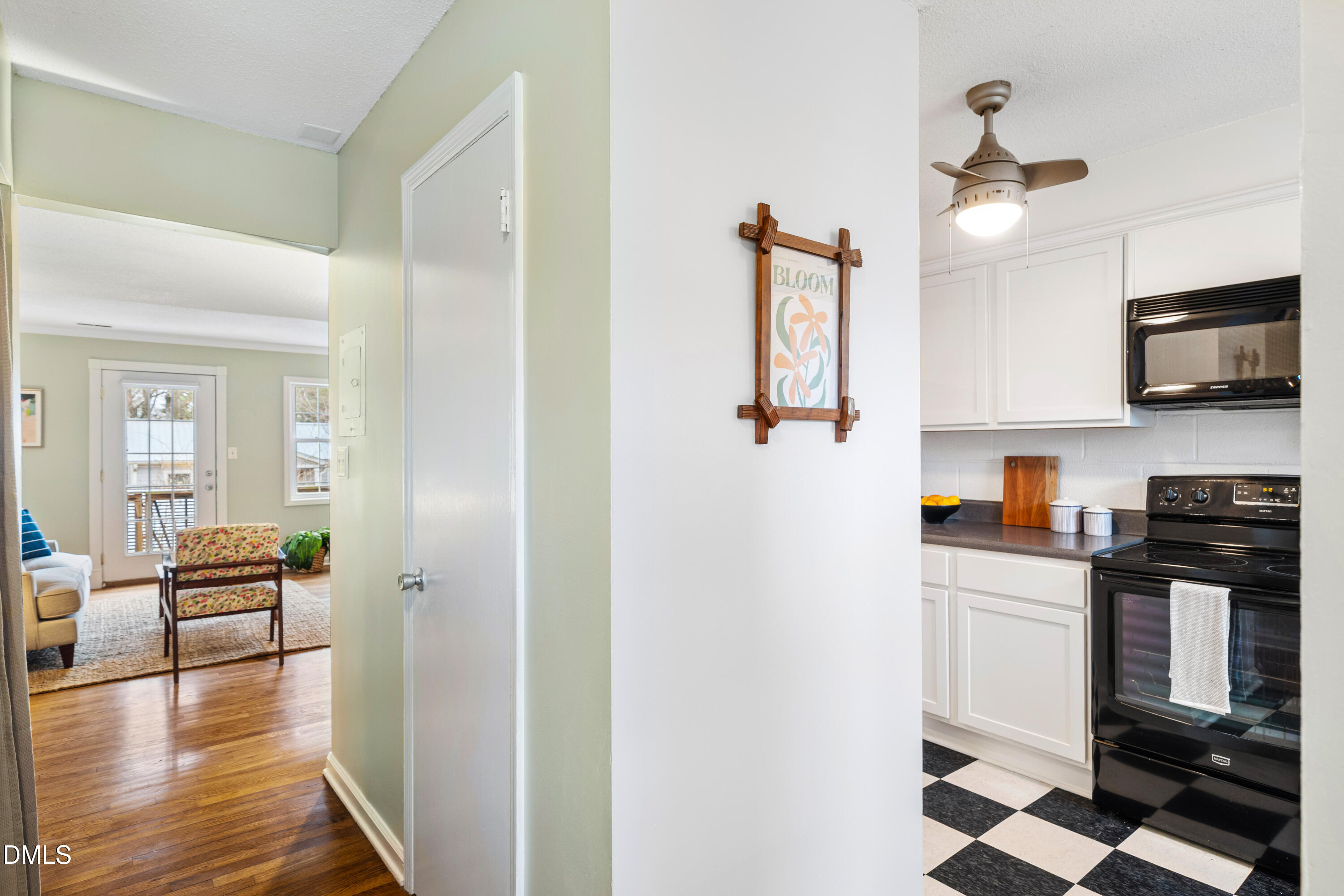 400 Davie Road, Unit 57 Carrboro, NC 27510 - Photo 5 of 28 a kitchen with stainless steel appliances granite countertop a refrigerator and a stove top oven