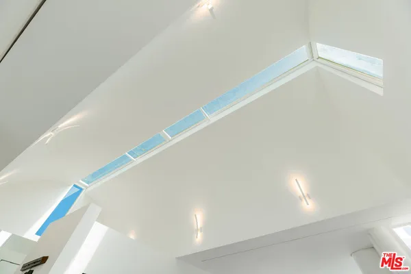 a view of balcony with furniture