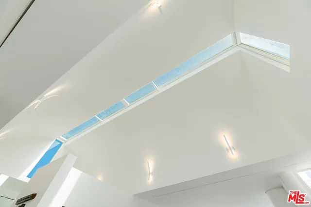 a view of balcony with furniture